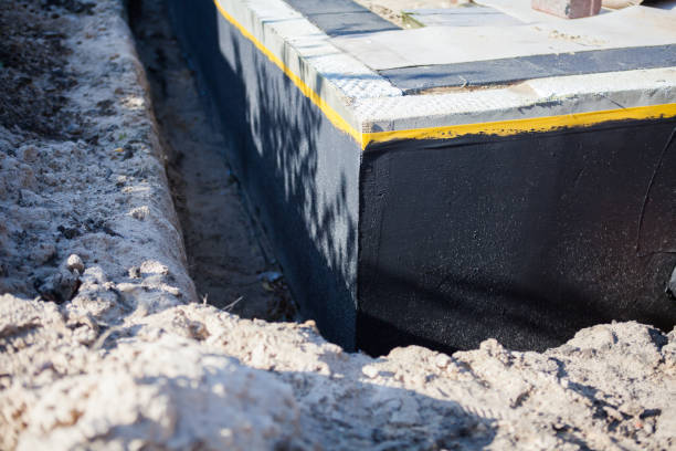 Professional Waterproofing technician working in Golf, IL